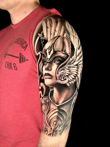 Explore grease tattoo ideas, creative tattoo ideas in Denver, available at Certified Tattoo Studios