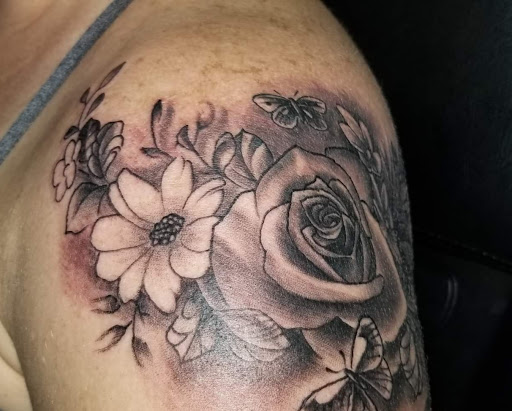 Explore tattoo ideas for nieces and nephews, creative tattoo ideas in Angola, available at Hoodlum Ink