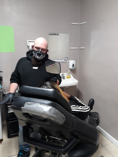 Explore 1991 tattoo ideas, creative tattoo ideas in Portsmouth, available at World Famous Blue Horseshoe Tattoo and Piercing