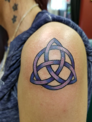 Tattoo Shop «Wizards World», reviews and photos, 801 W High St, Stowe, PA 19464, USA