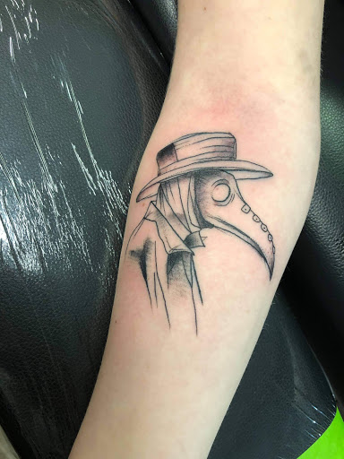 Explore charm tattoo ideas, creative tattoo ideas in Goose Creek, available at Red Kirin Tattoo