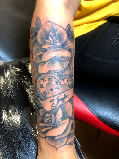 Explore reading tattoo ideas, creative tattoo ideas in Hammond, available at Famous Ink, Inc.