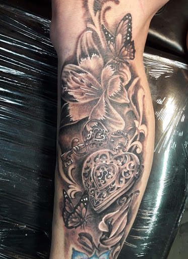 Explore gun tattoo ideas, creative tattoo ideas in Cocoa Beach, available at The Corner Tattoo and Piercing Studio