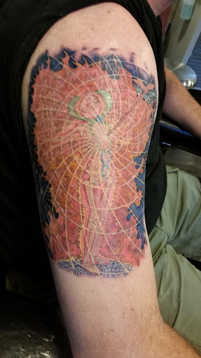 Explore biker tattoo ideas, creative tattoo ideas in Golden, available at Faith Tattoo Gallery