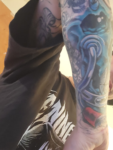 Explore biking tattoo ideas, creative tattoo ideas in Wichita, available at Artist At Large Tattoo