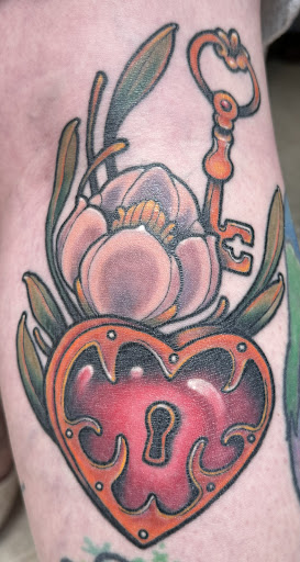 Explore tattoo ideas on rib cage, creative tattoo ideas in Council Bluffs, available at Crimson City Tattoo