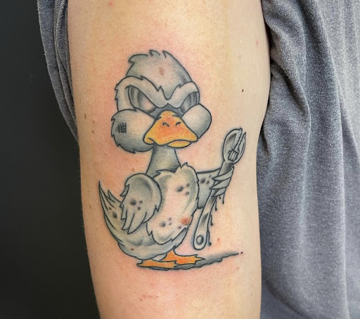 Explore ice hockey tattoo ideas, creative tattoo ideas in Sayville, available at Dark Timez Tattoo and Piercing