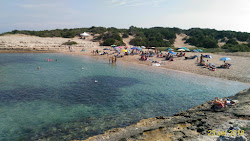 Photo de Spiaggia di Torre Pozzelle avec petite baie