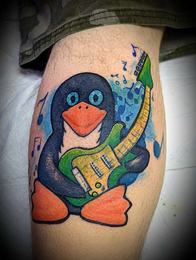 Find tattoo ideas between breast for your next unique tattoo in Nevada at Generation X Tattoos and Piercings