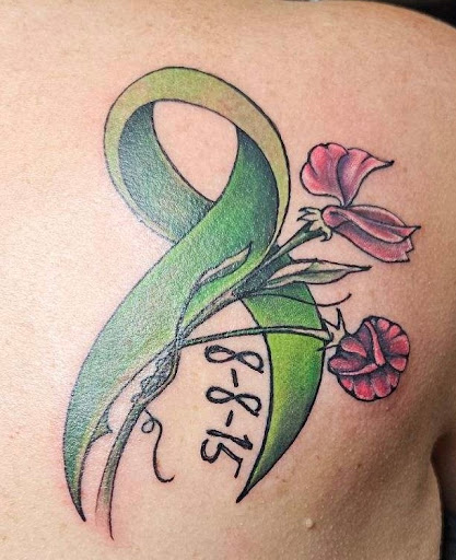 Explore tattoo ideas side stomach, creative tattoo ideas in Middletown, available at Orange County Tattoo & Body Piercing Studio