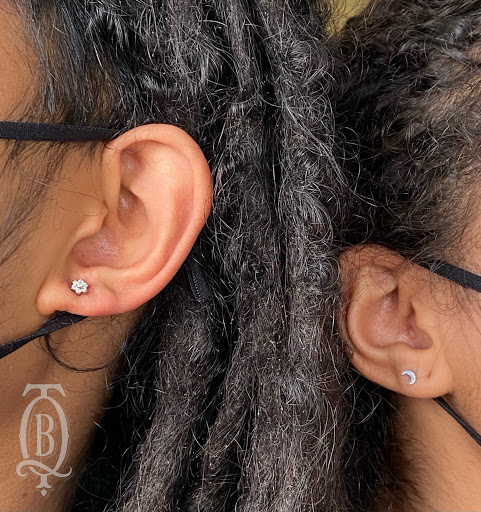 Explore compass tattoo cover up ideas, creative tattoo ideas in Marietta, available at The Queen Bee Tattoo and Piercing Parlour