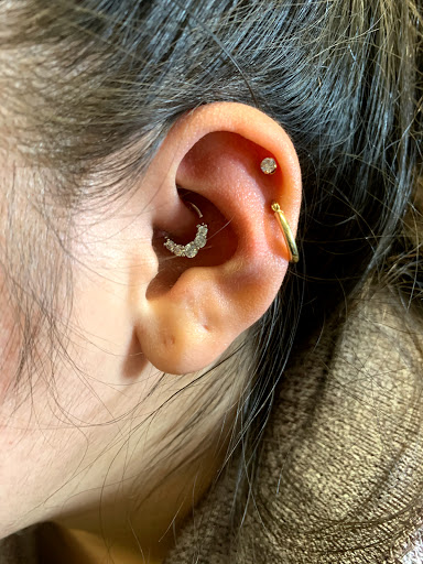 Explore neck tattoo ideas for women, creative tattoo ideas in Bethlehem, available at Studio 33 Piercings by Angi