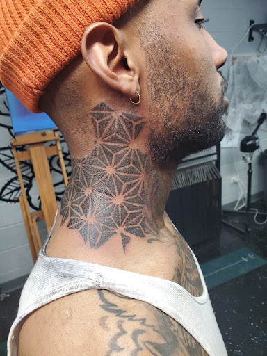 Explore small hand tattoo ideas, creative tattoo ideas in Newport, available at Mutiny Tattoo Co. LLC