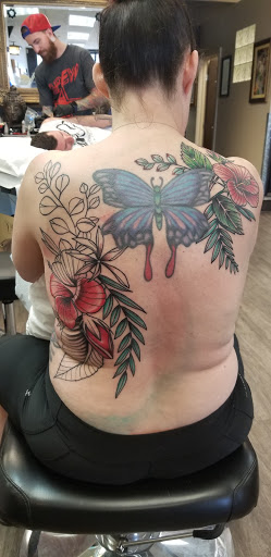 Tattoo Shop «White Lotus Custom Tattoo & Professional Piercing», reviews and photos, 7138 E County Line Rd, Highlands Ranch, CO 80126, USA
