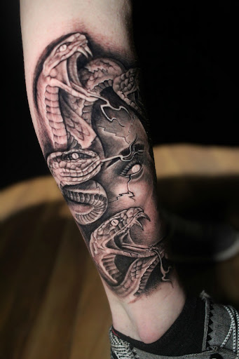 Find creative number tattoo ideas for your next unique tattoo in Homosassa at Citrus Tattoos