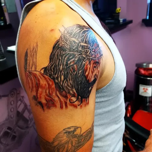 Explore religious tattoo ideas for men, creative tattoo ideas in Jacksonville, available at Jax Ink Tattoo & body piercing