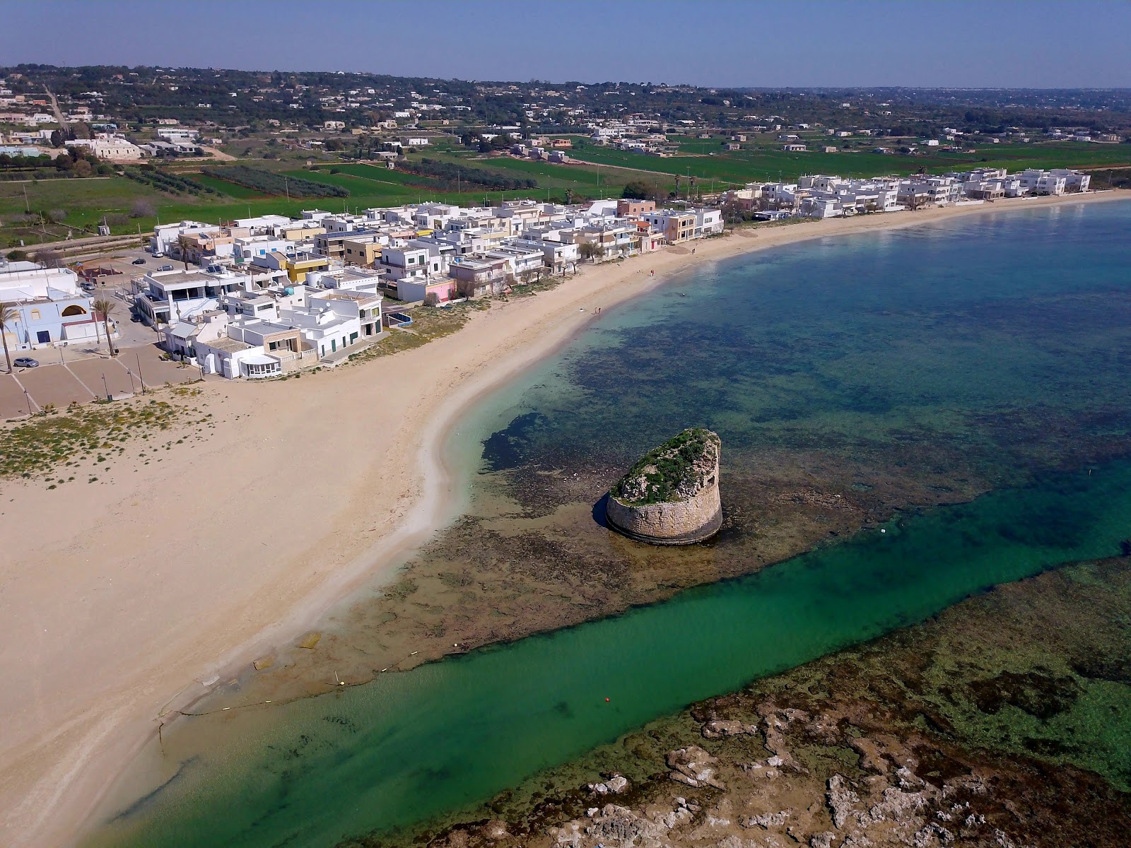 Φωτογραφία του Spiaggia Marina Di Salve με καθαρό μπλε νερό επιφάνεια