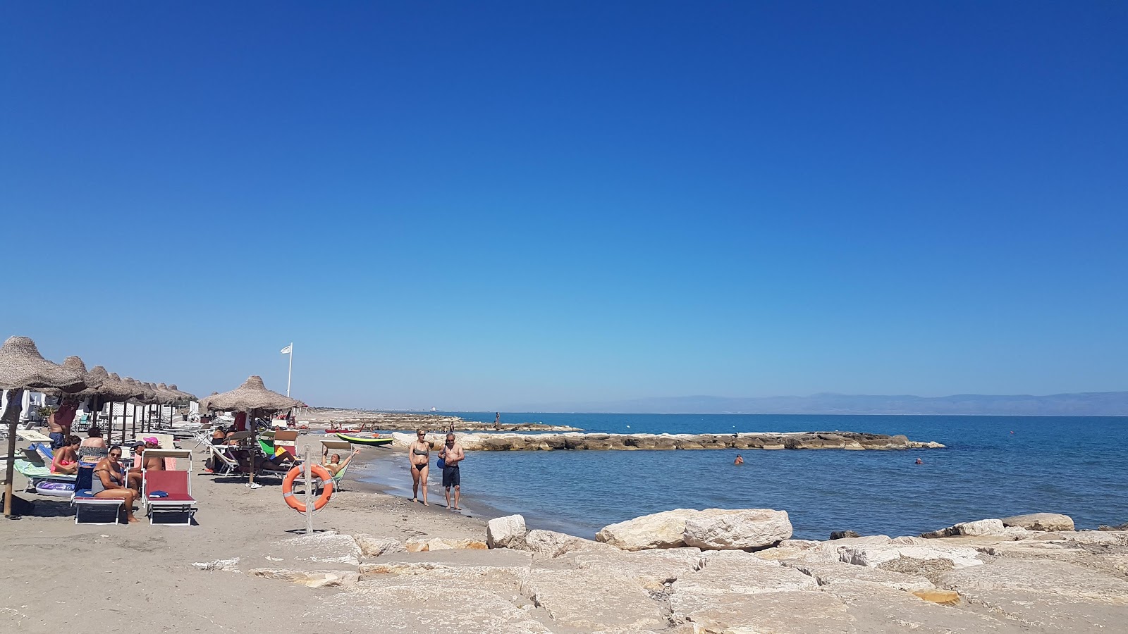 Ipanema White Beach'in fotoğrafı geniş bir kıyı şeridi ile birlikte