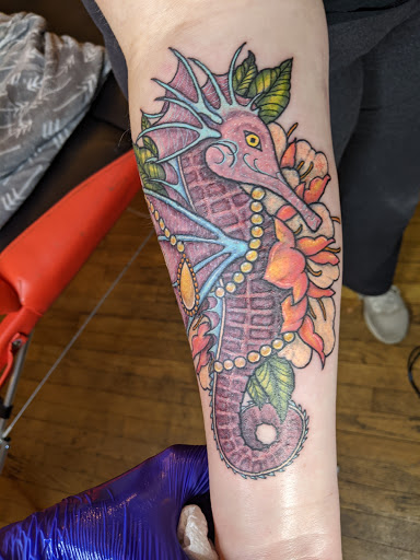Find arm half sleeve tattoo ideas for your next unique tattoo in Canton at The Inkeepers Tattoo Parlor
