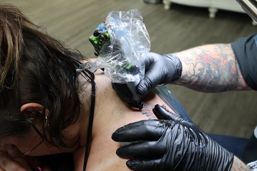 Explore child tattoo ideas for dad, creative tattoo ideas in Spokane, available at Platinum Rose Tattoo Studio