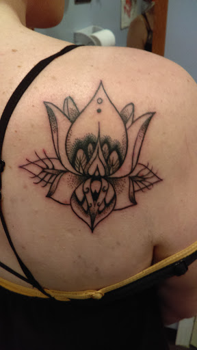 Explore gargoyle tattoo ideas, creative tattoo ideas in Bridgeport, available at Pike Street Studios Tattoo and Body Piercing