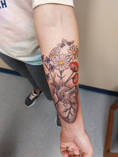 Explore momma tattoo ideas, creative tattoo ideas in East Peoria, available at Hybrid Art Studios-Tattoos