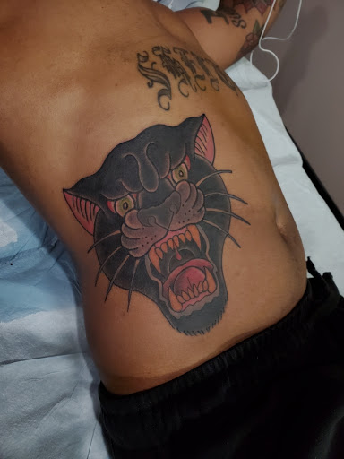 Explore behind the ear tattoo ideas, creative tattoo ideas in Libertyville, available at Lucky Seven Tattoo