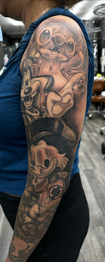 Explore billy joel tattoo ideas, creative tattoo ideas in La Habra, available at Raining Ink Tattoo Studio