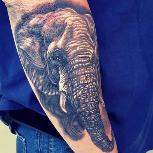 Explore women's first tattoo ideas, creative tattoo ideas in Ocoee, available at Slaughterized Ink Tattoo and Piercing Studio