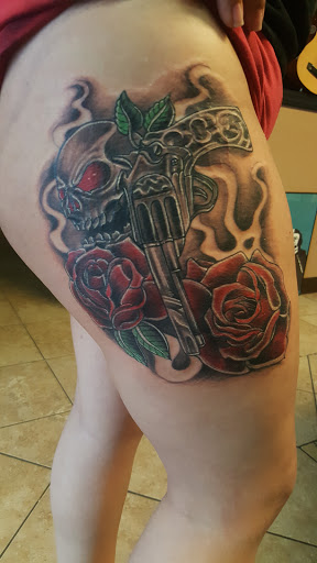 Find peacock tattoo ideas for your next unique tattoo in Wilson at New Addiction Tattoos