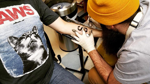 Explore poke and stick tattoo ideas, creative tattoo ideas in Milwaukee, available at Bay Street Tattoo Co.