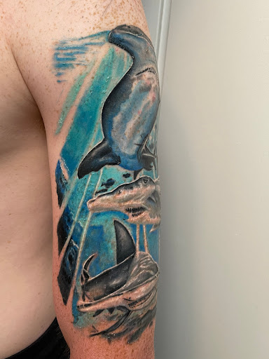 Explore arm tattoo ideas female, creative tattoo ideas in Sarasota, available at SEVEN SINS Tattoo Studio