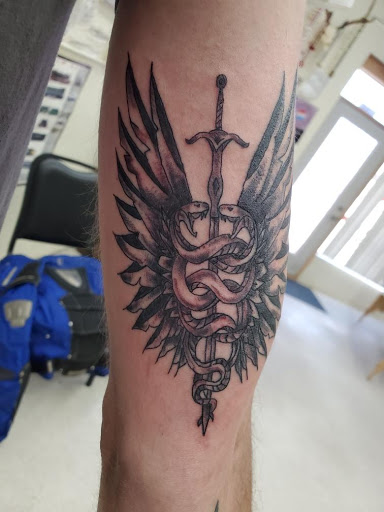 Explore divergent tattoo ideas, creative tattoo ideas in Casper, available at Electric Hare Tattoo