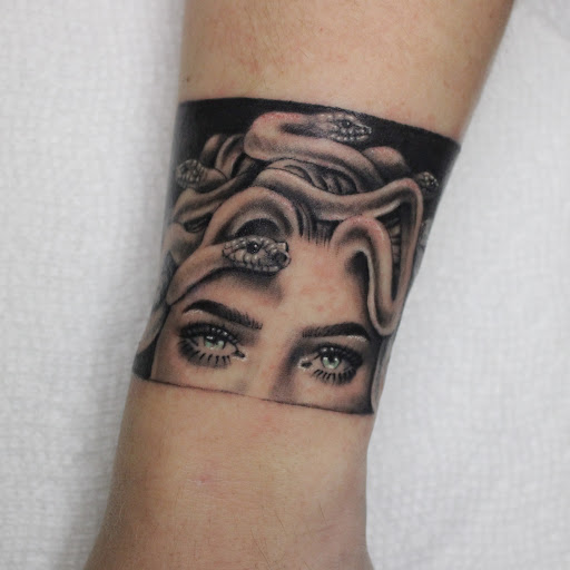 Explore tattoo ankle ideas, creative tattoo ideas in Johnstown, available at Lemon Bomb Tattoo Co.