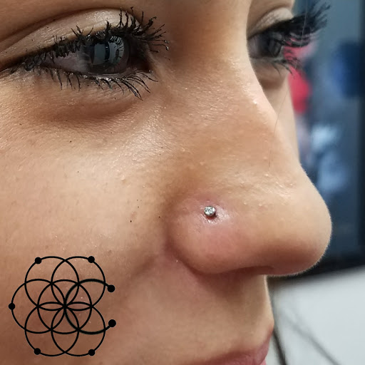 Explore kayak tattoo ideas, creative tattoo ideas in Sarasota, available at Z-Edge Tattoo & Body Piercing South Shop