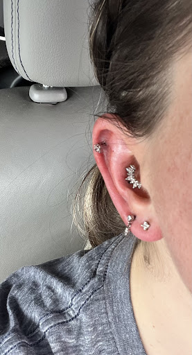 Explore tattoo cover up ideas for shoulder, creative tattoo ideas in Riverton, available at The Piercing Place