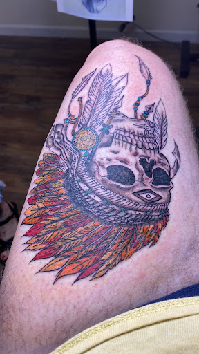 Explore matching tattoo ideas for husband and wife, creative tattoo ideas in Cornelia, available at Prismatic Pulse Tattoo