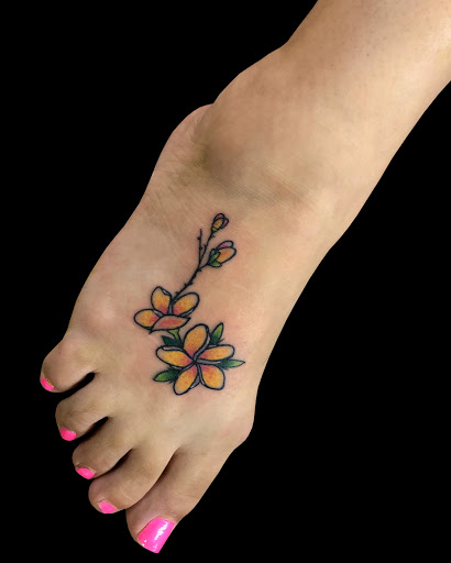 Explore iris tattoo ideas, creative tattoo ideas in Lahaina, available at Sweet Trade Tattoo