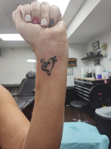 Find simple cat tattoo ideas for your next unique tattoo in Nashville at Nashville Ink