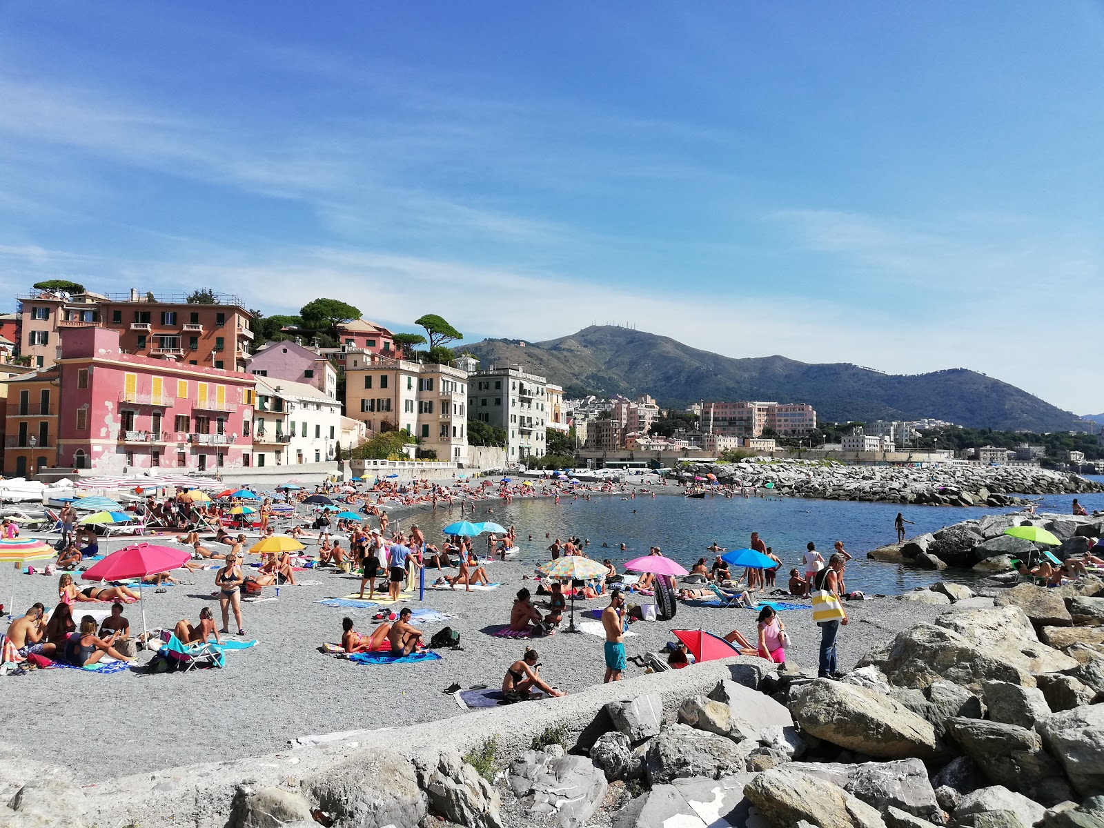 Photo of Boccadasse Beach with gray fine pebble surface