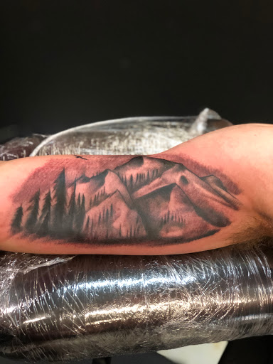 Explore nerd tattoo ideas, creative tattoo ideas in San Antonio, available at Nite Owl Tattoo Studio