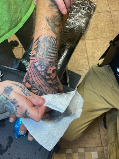 Explore wwe tattoo ideas, creative tattoo ideas in Onalaska, available at Rock Bottom Tattoo Studio