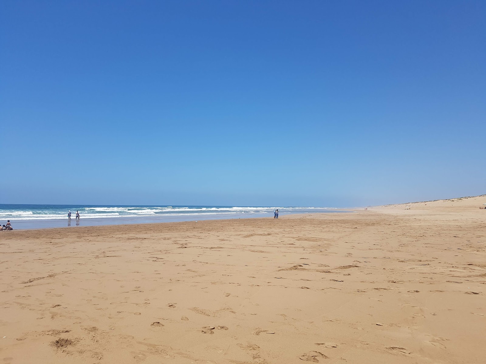 Foto van Plage Sidi Boughaba met helder fijn zand oppervlakte