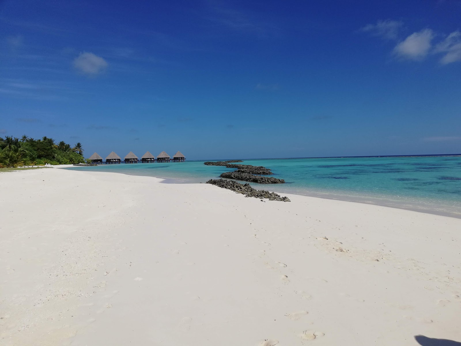 Foto van Velidhu Island Resort met turquoise puur water oppervlakte