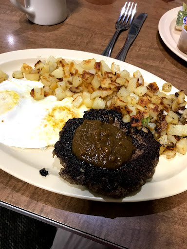 Hamburger patty,(salsa added), eggs and potatoes 