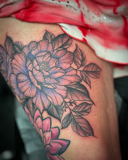 Explore catholic tattoo ideas for guys, creative tattoo ideas in Fort Myers, available at Loyal 2 The Coil Tattoos & Piercings (Edison Mall Location Entrance F)