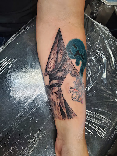 Explore honeycomb tattoo ideas, creative tattoo ideas in Spokane, available at Anchored Art Tattoo