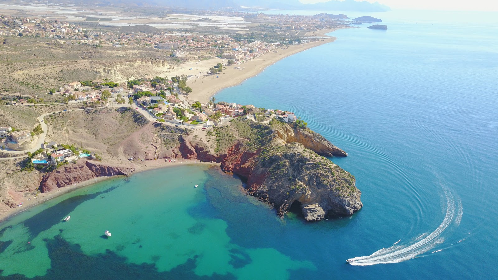 Foto van Bolnuevo Strand met turquoise water oppervlakte