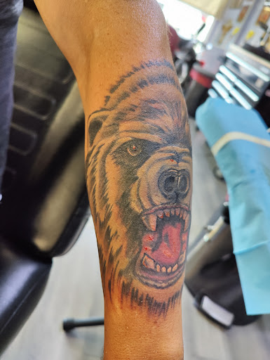 Find tattoo ideas for upper arm men for your next unique tattoo in Ottawa at Purple Rose Tattoos & Piercings