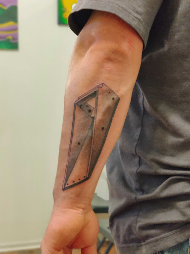 Explore father and son tattoos ideas, creative tattoo ideas in Hebron, available at Explosive Ink Tattoo